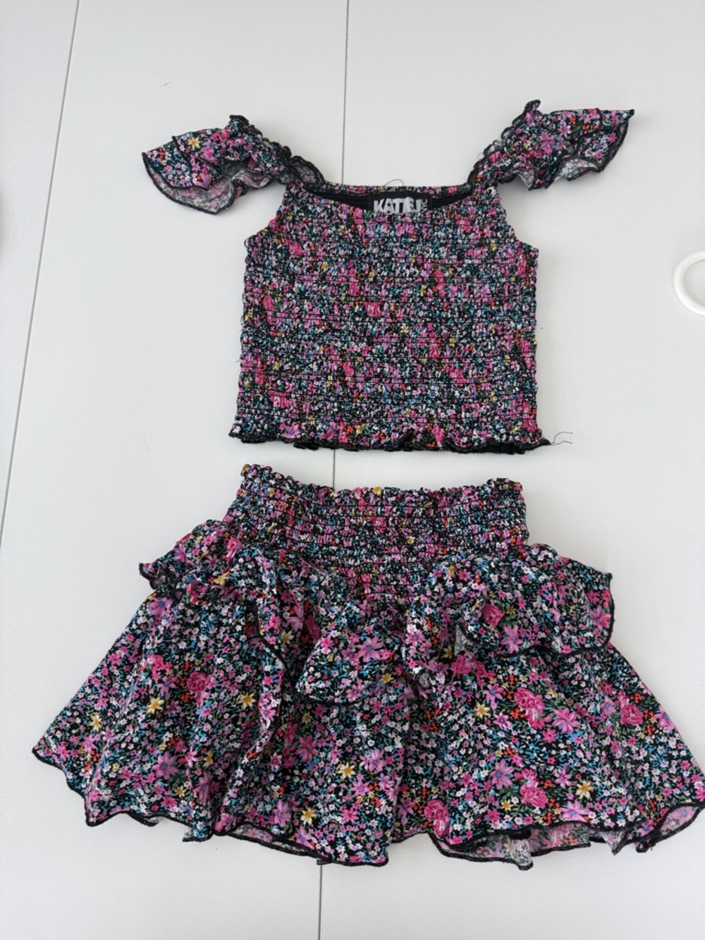 Katie J NYC Black Floral Smocked Top & Ruffled Skirt - Pink, Blue, Yellow